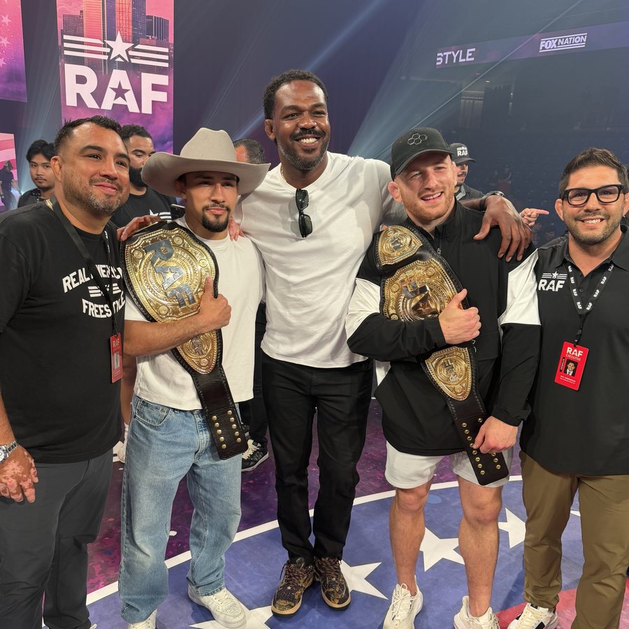 Dr. Tannenbaum with RAF co-founder Izzy Martinez and RAF champions at a Real American Freestyle event